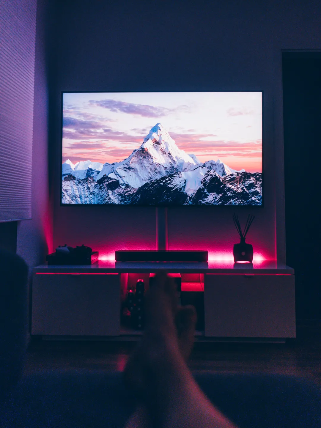 Wall mounted television, with hidden antenna and data cables.